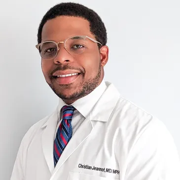 A man in white lab coat and glasses.